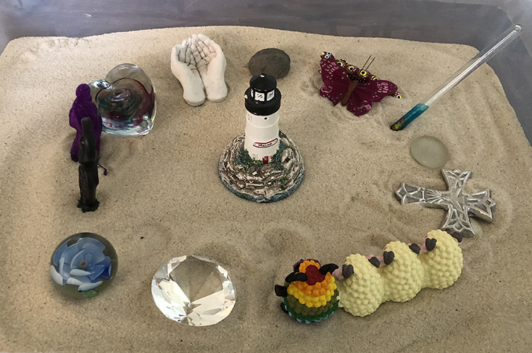 Sand tray for play therapy at Butterfly Beginnings Counseling in Davenport, Iowa