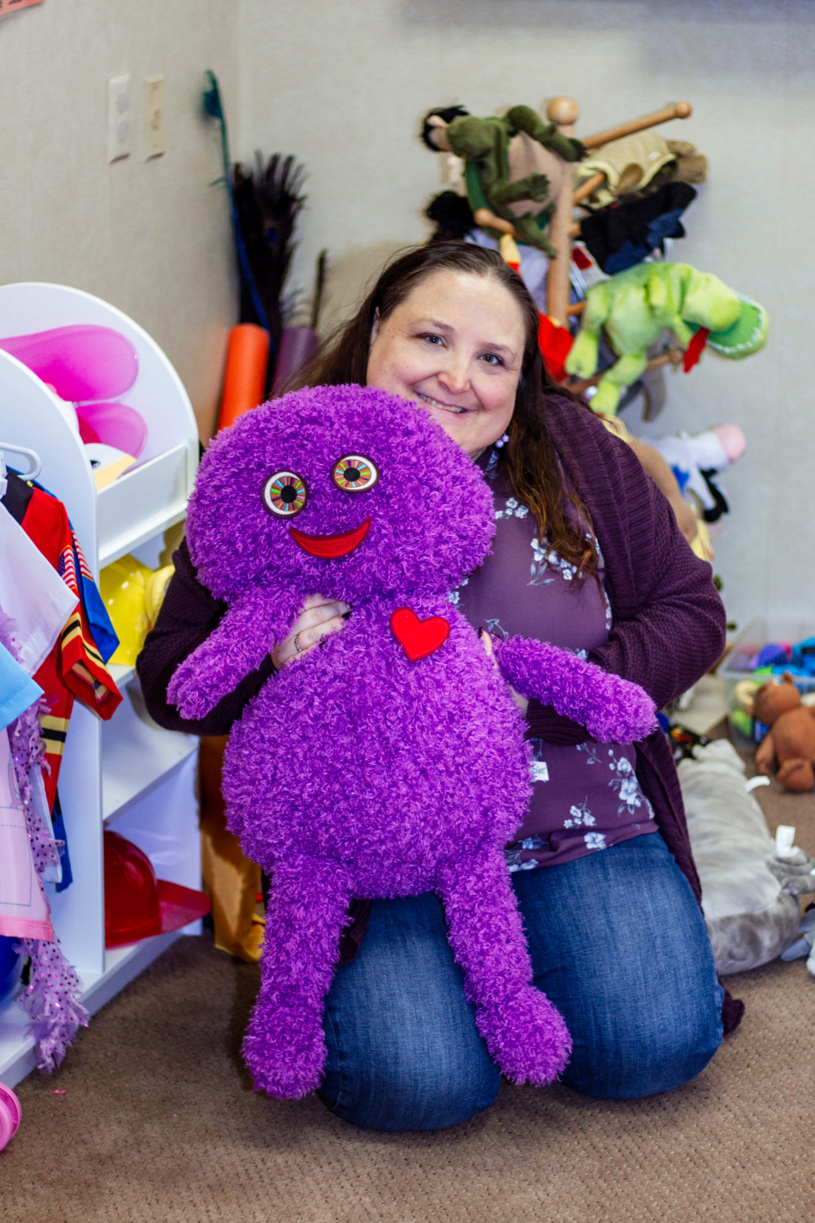 Butterfly Beginnings Play Therapy in Davenport, Iowa Kim Feeney Holds Toy