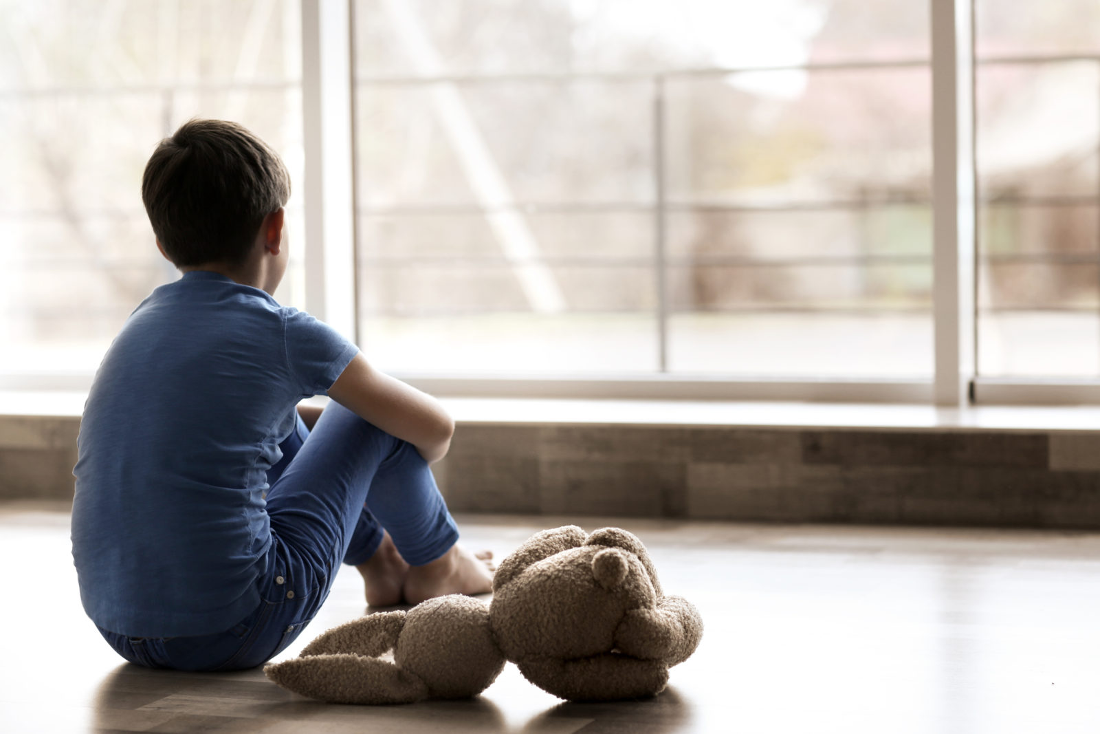 Image of Depressed Child from Butterfly Beginnings Play Therapy in Davenport, Iowa Kim Feeney