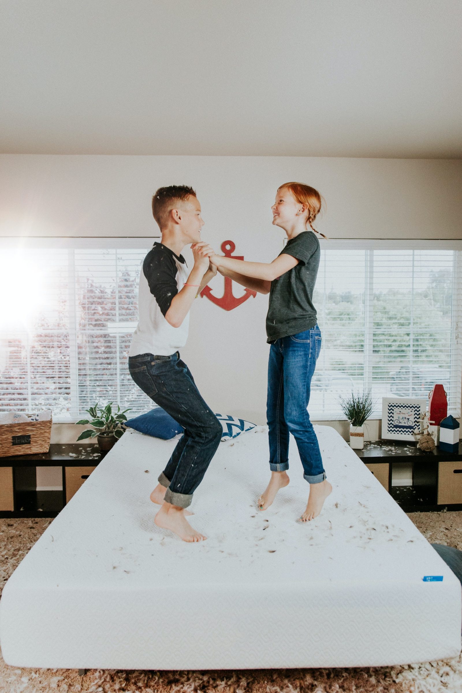 Image of older kids playing happily for blog: Help Siblings get along with Kim Feeney at Butterfly Beginnings Play Therapy in Davenport, Iowa