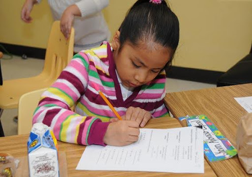 Image of child taking an exam for butterfly beginnings play therapy in eastern iowa blog: testing anxiety